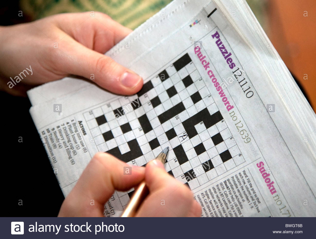 Solving A Quick Newspaper Crossword, London Stock Photo: 32946995 - Guardian Quick Crossword Printable Version